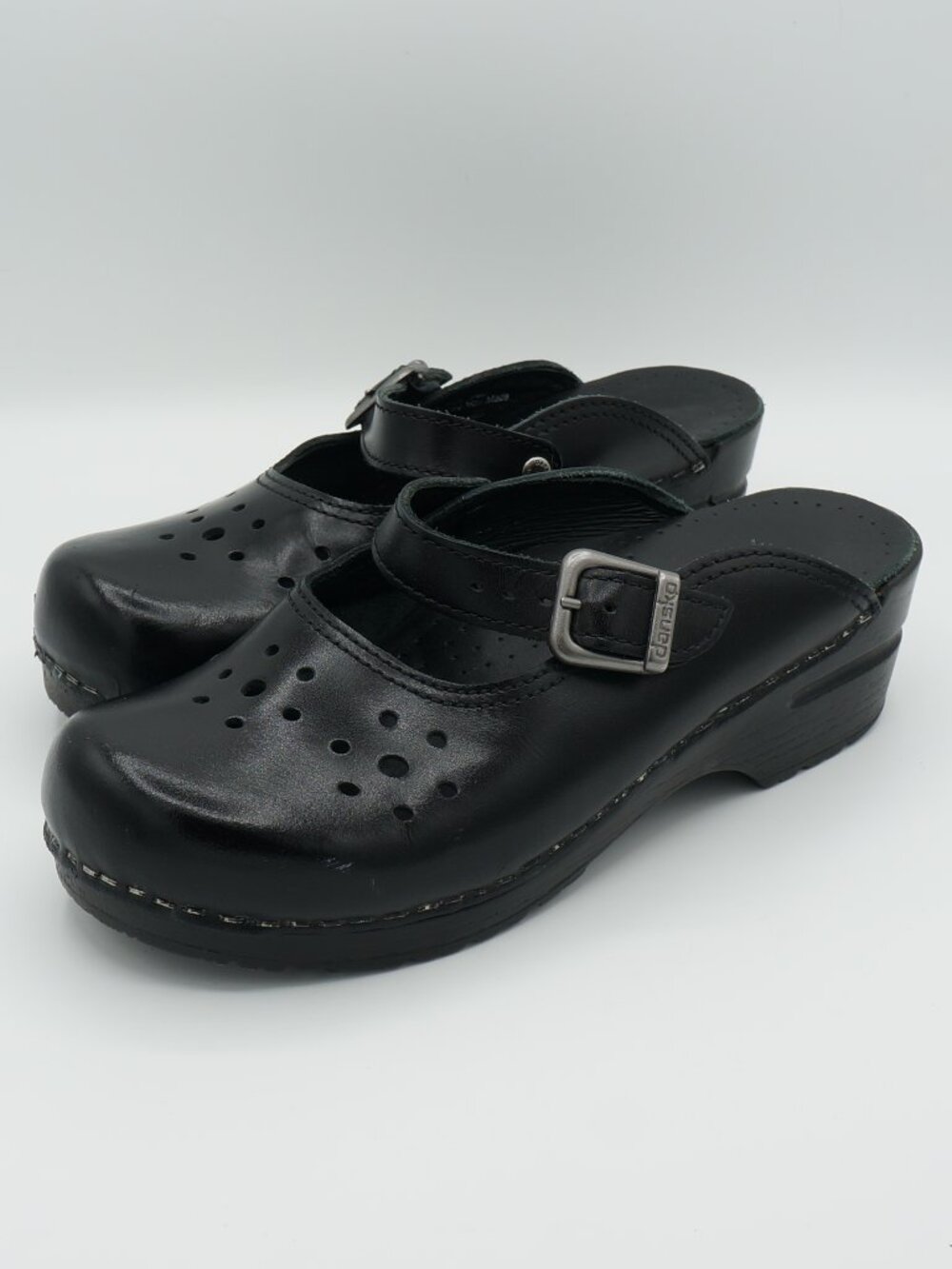 Dansko Women's EU 38 (US 7.5-8) Black Leather Perforated Buckle Mule Clogs